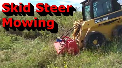 mowing a park with skid steer|skid steer lawn mower.